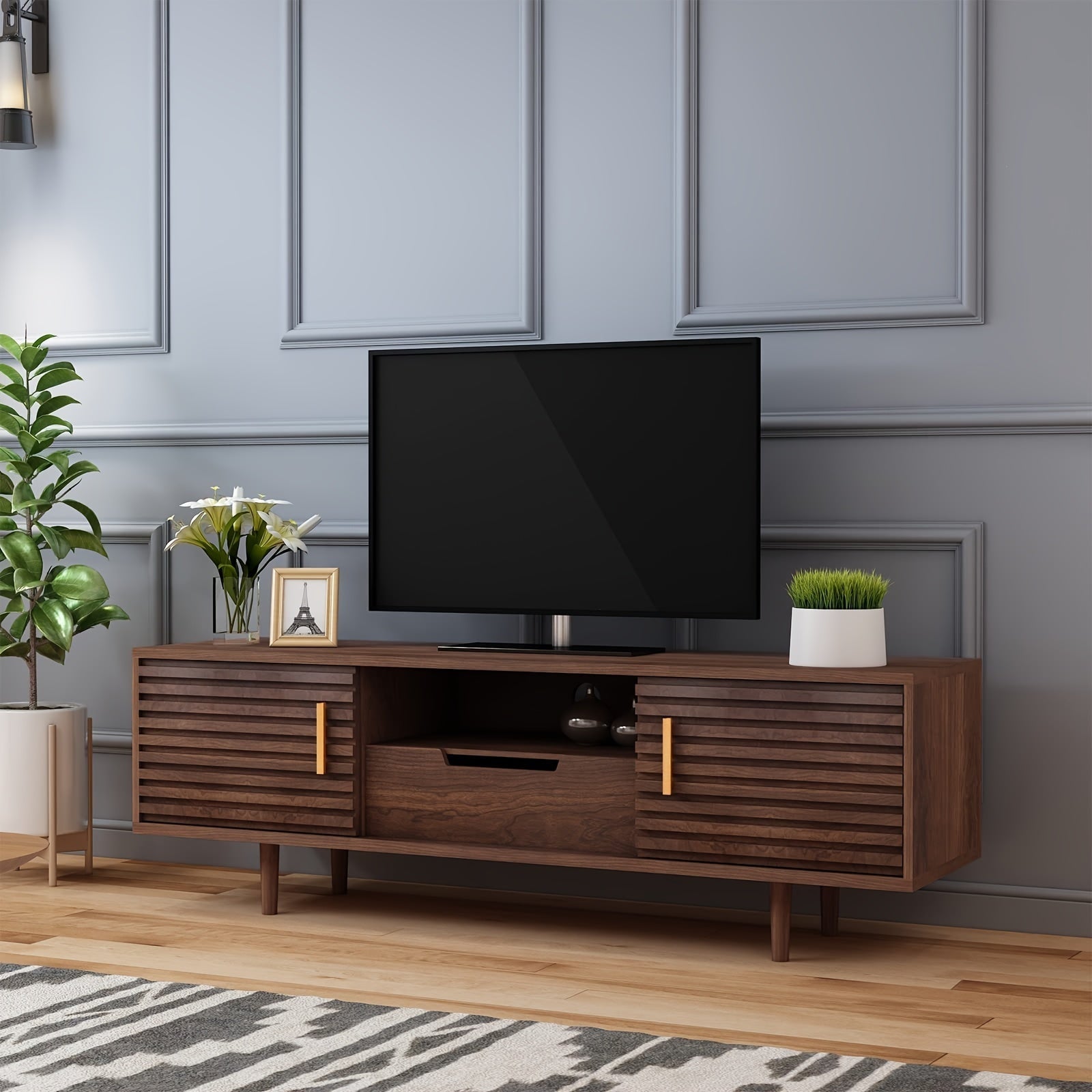 Media entertainment center with clean lines, rustic brown, and a spacious tabletop for TVs up to 65", combining modern and vintage style is a little piece of art at home. You can match this Mid-century TV stand with nightstan